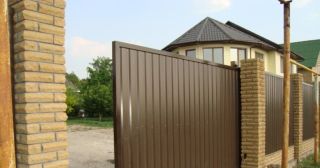Купить откатные ворота из профнастила Красногорск, цена от 1773 руб.